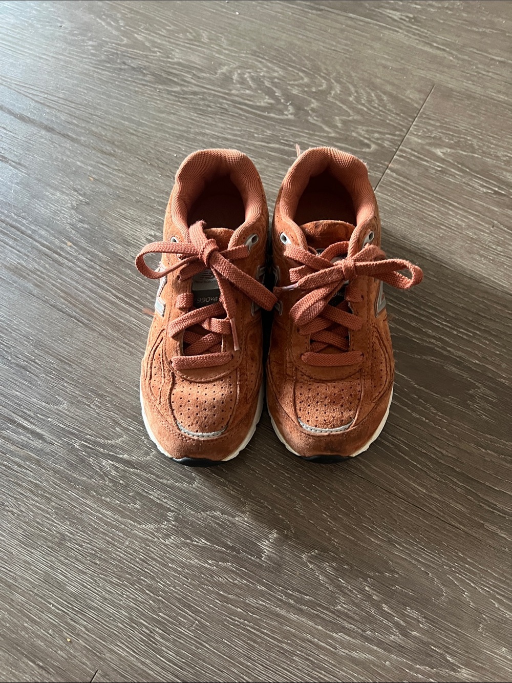 New Balance Kids Suede Sneakers in Rust Orange